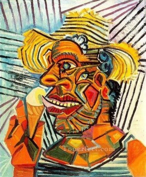 パブロ・ピカソ Painting - アイスクリームコーンを持つ男 3 1938 年キュビズム パブロ・ピカソ